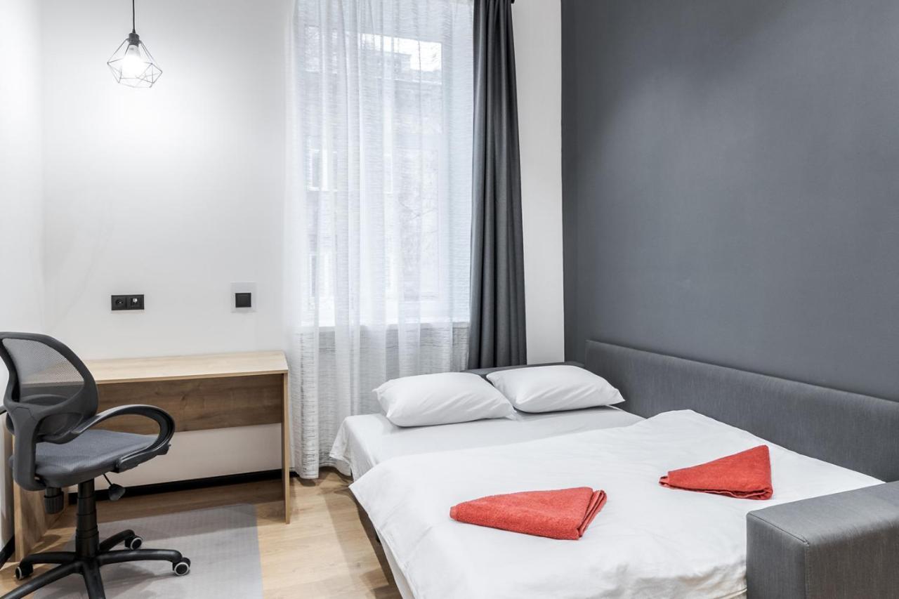 Modern Apartment In The Old City Львов Экстерьер фото